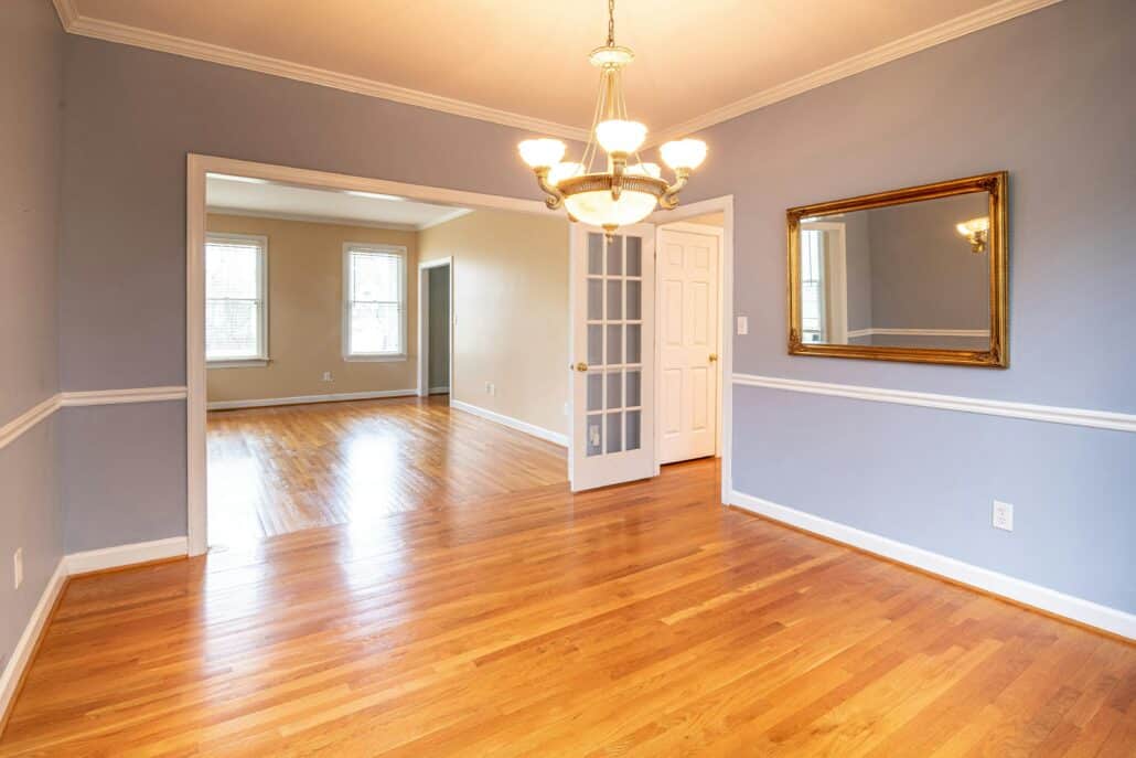 an empty house with light blue walls