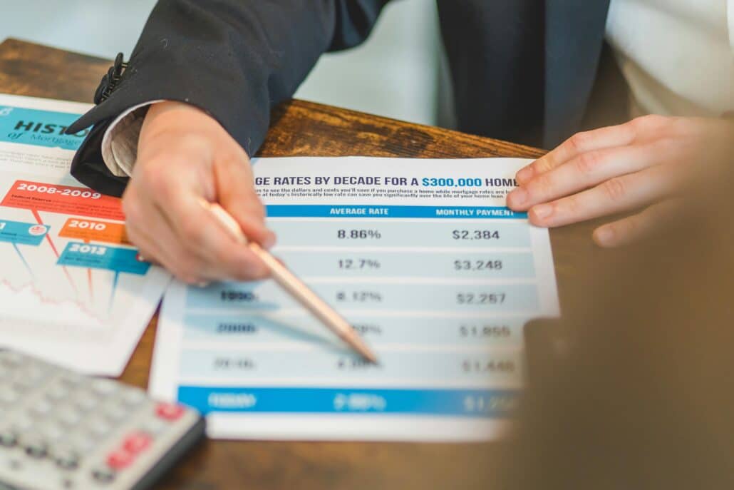 someone pointing out different mortgage rate prices